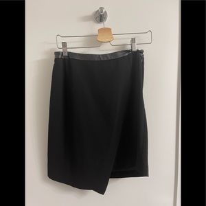 Black asymmetrical wrap-style with faux leather trim